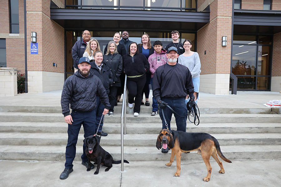 criminal justice students and faculty members during a TDCJ K9 visit