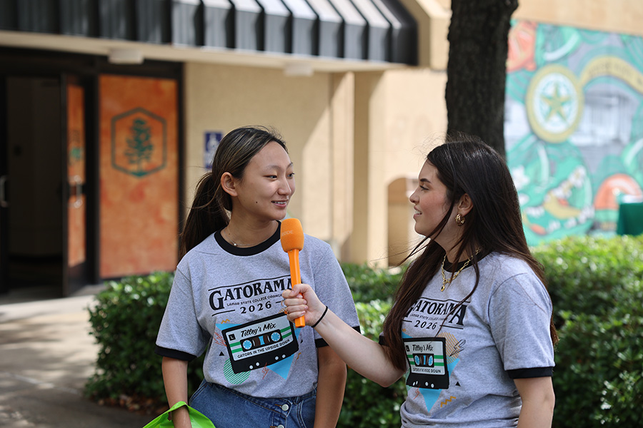 SGA president interviewing former student during campus event