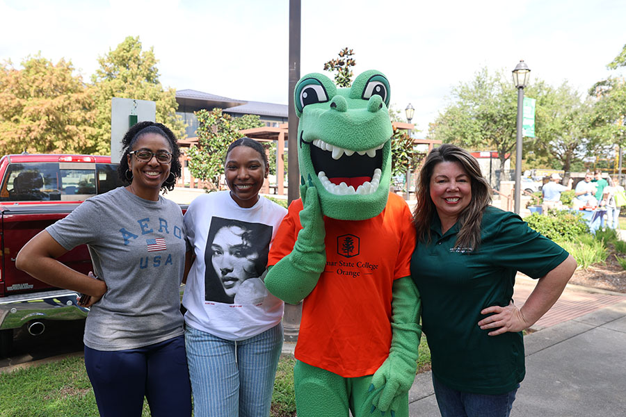 staff posing with Tilley the mascot