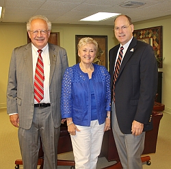 Gisela Houseman, center, is pictured with Dr. Mike Shahan, left, president of Lamar State College – Orange and Dr. Shawn Oubre, president of Lamar Institute of Technology Foundation Board of Directors.